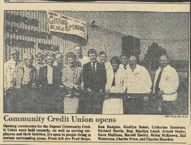 Newspaper article titled "Community Credit Union opens" with picture.